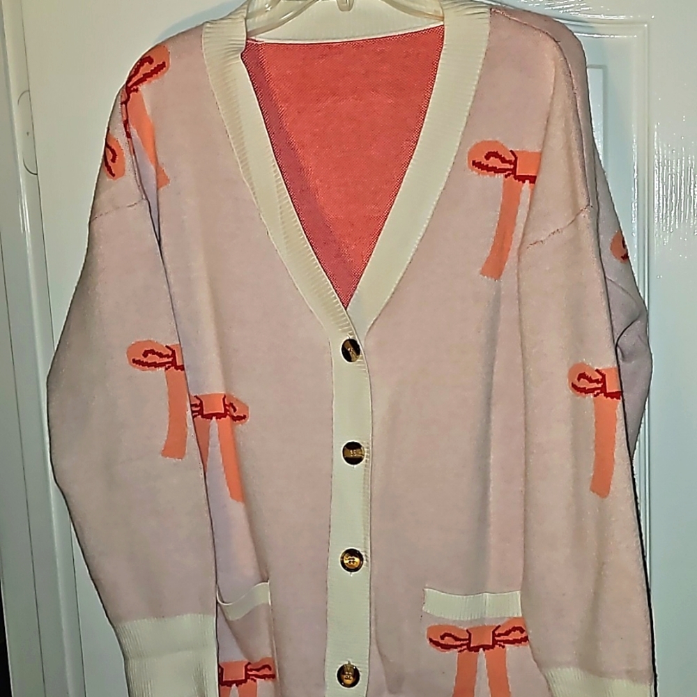 Oversized cardigan with bow print